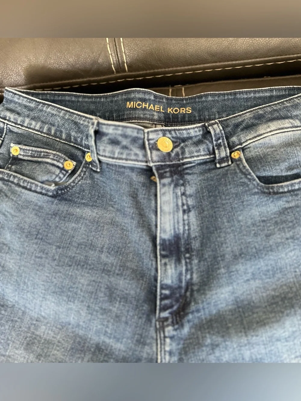 Michael Kors Medium Wash Slim Leg Jeans with Gold MK Logo